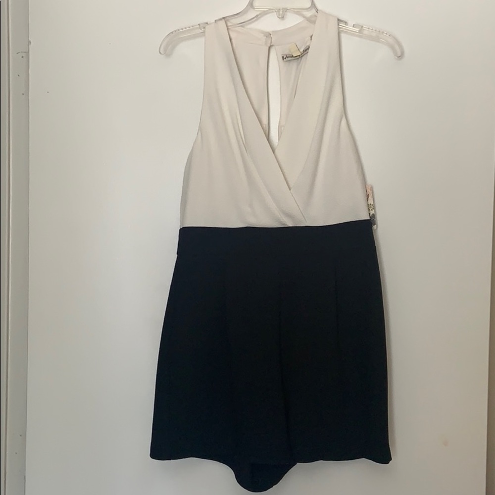 BRAND NEW with tags. Black and White Romper.